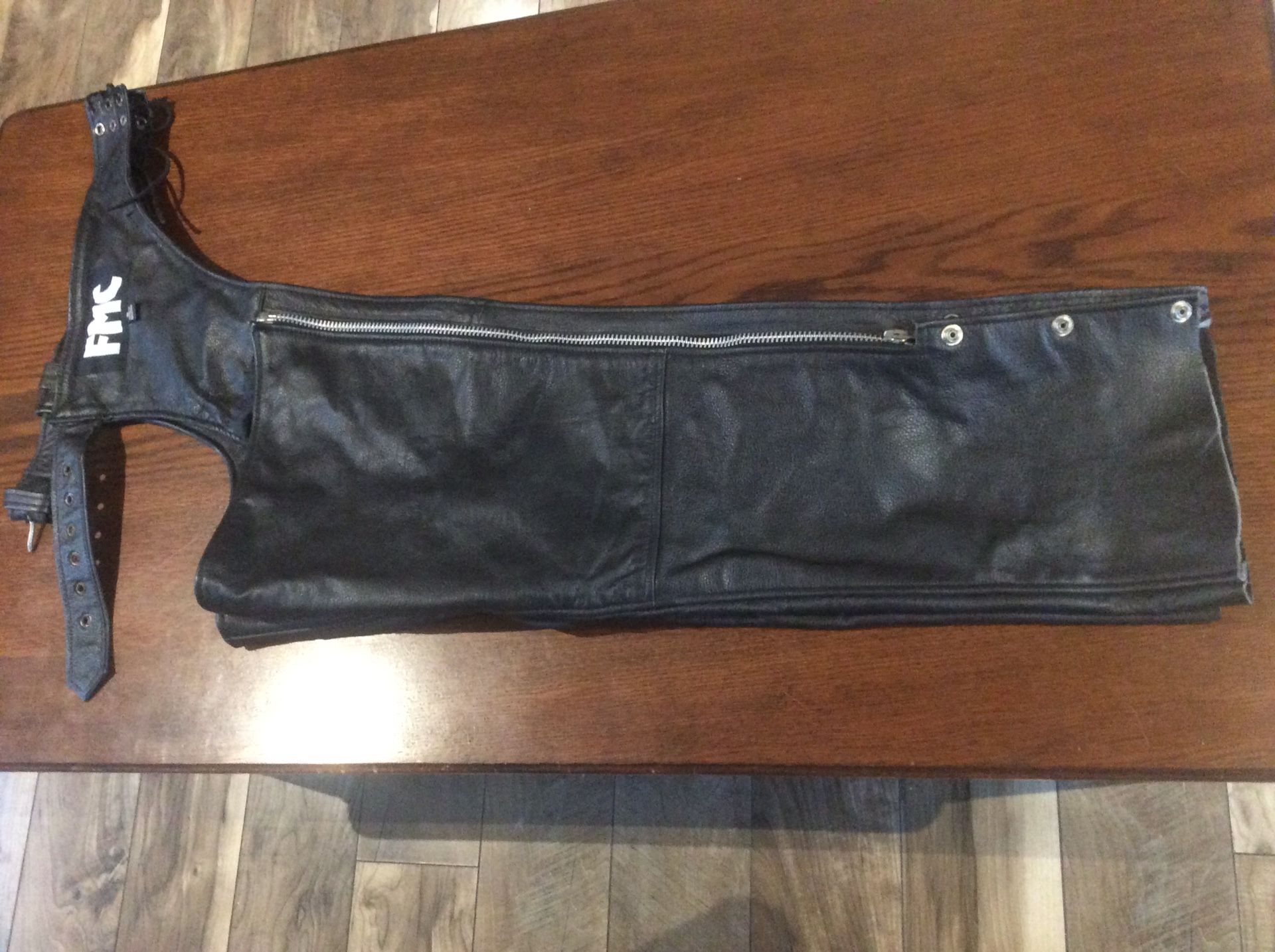 FMC Black leather chaps size small.