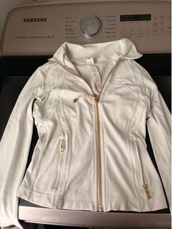 White lulu lemon jacket with gold zipper