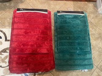 Brand new memory foam mat sets-$10- 20x32 and 17x14. higley and ray.