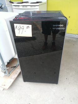 Dorm Refrigerator black excellent condition . Warranty . Delivery available . 2203 Fowler st. Ft. Myers 33901