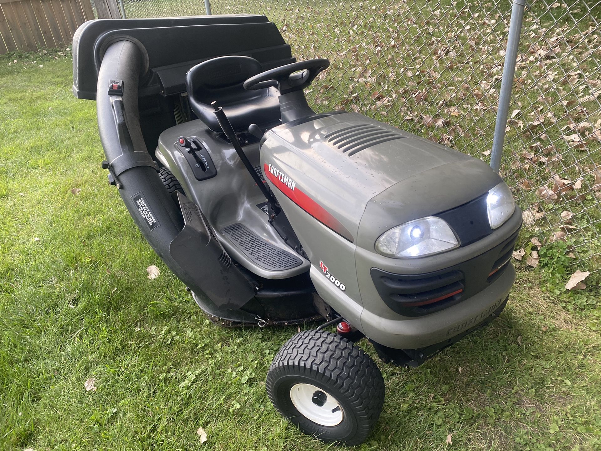 Auto Trans Riding Lawn Mower with Triple Bagger System and Available Tow Cart