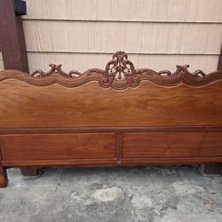 Gorgeous hand carved Solid Rosewood bed frame. King size.