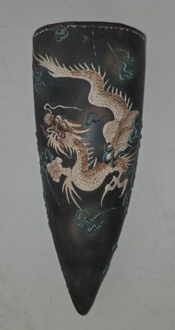 Vintage Japanese moriage raised dragon wall pocket vase. Measures 12 x 5 x 4 inches. 3‑D embossed dragon and cloud motif on black background. Hanging 