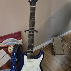 Silvertone guitar and amp (stand included)