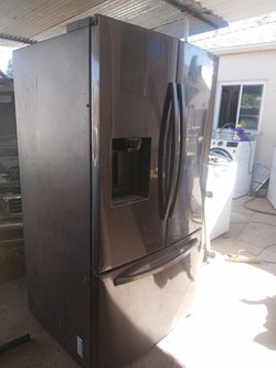 Samsung refrigerator in excellent condition look like new everything work two ice machine delivery installation available 30 days guarantee $800 with