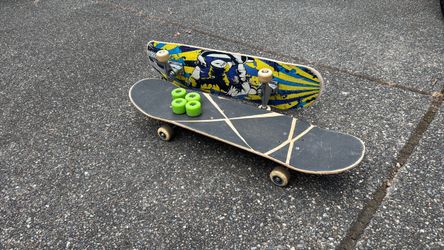TWO skateboards (+ spare wheels)