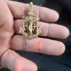 Is 14 carrot gold Is sailor anchor crucifix