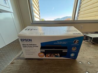 Professional Epson R280 photo printer is designed for high-definition photo, CD, and document printing. This black and silver unit has automatic photo
