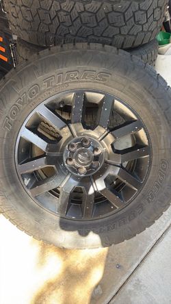 Nissan frontier 18” wheels with Toyo Open Country AT3