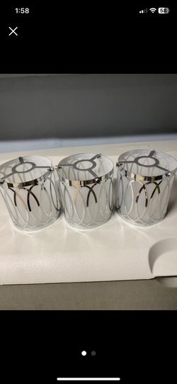 Set of 3 Silver Patterned lamp shade hanging over kitchen Island