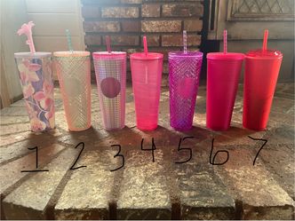 Pink and Red Starbucks Cups