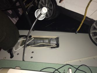 Table with all accessories for sewing machine