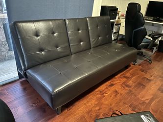 Black Tufted bonded leather sofa