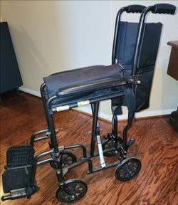 Transport Wheelchair with Footrests.