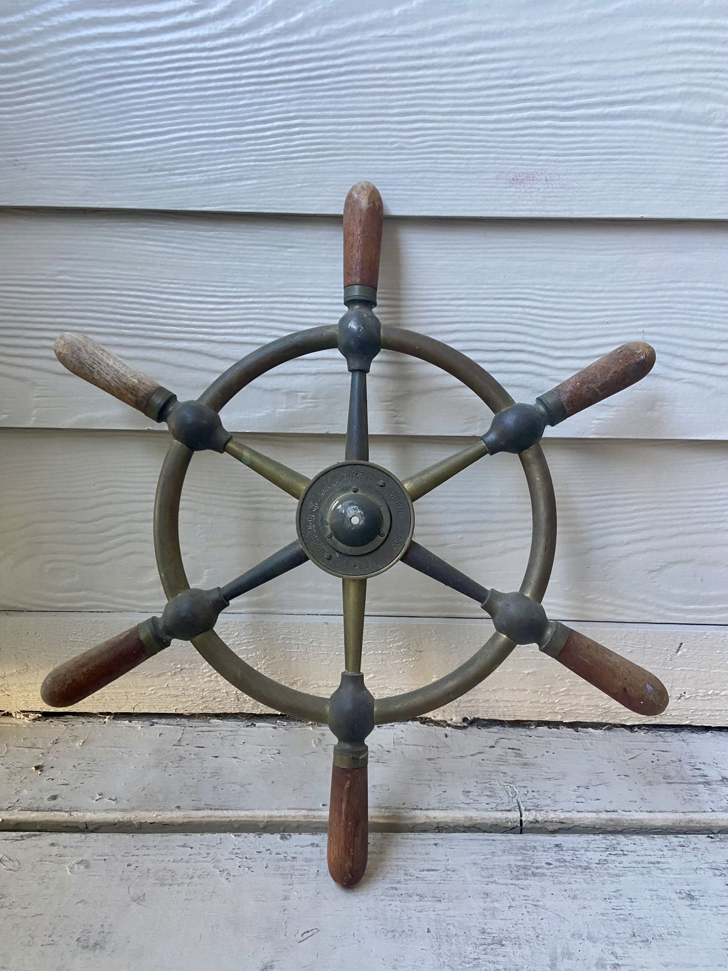 Fishing Poles, Net & Captain Nautical Wheel