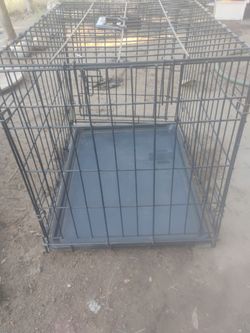 Medium sized metal heavy duty cage good for small dogs