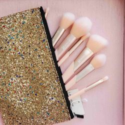 pink kabuki makeup brush set with glitter makeup cosmetics bag