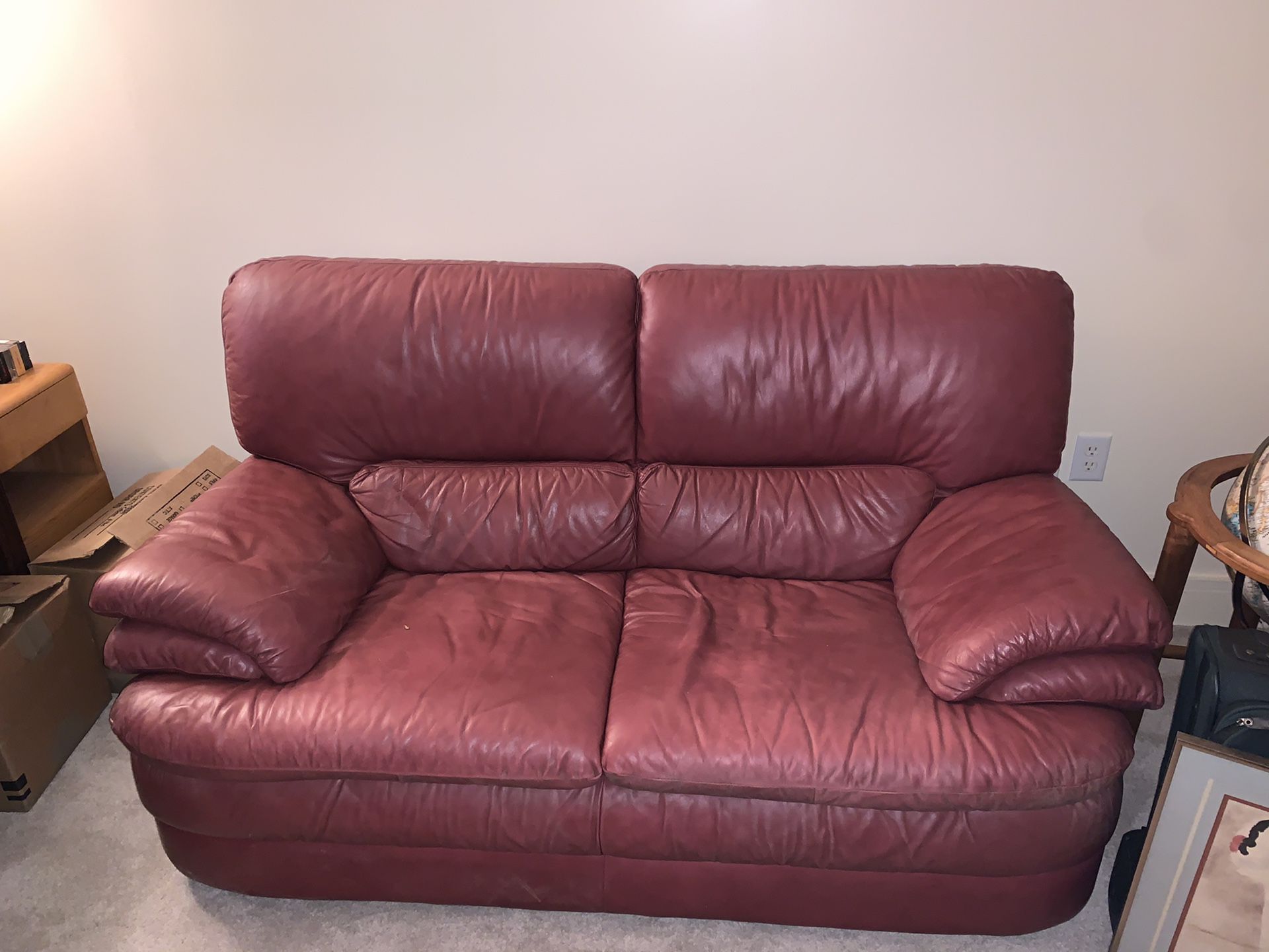 Leather couch, free to first person that wants it. Length 64; width 32; height 36