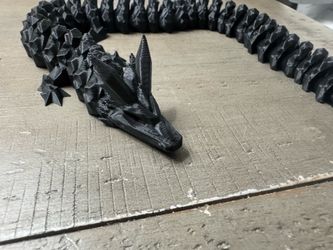 3D printed articulating dragon black toy/figurine