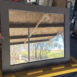 Charcoal gray mirror.