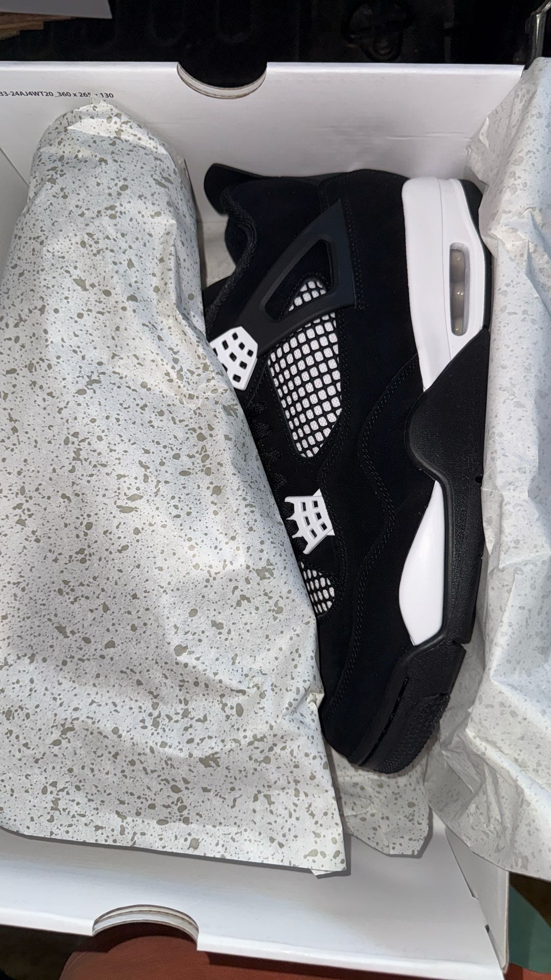 Black & White Thunder Jordan 4