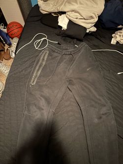Black nike tech cuffed pants (size medium)
