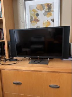 Hp 27 inch curved computer monitor.