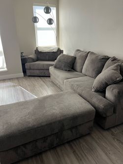 Grey chair, couch and ottoman