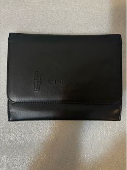 Brand new black leather Lincoln folder for owner manual