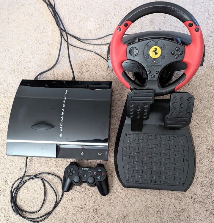 PlayStation 3 & Thrustmaster Racing Wheel (Ferrari Red Legend Edition) -Excellent Condition- Includes Gran Turismo 5 & NBA 2K11