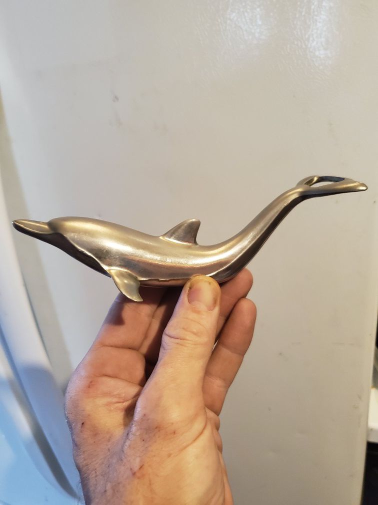 Antique dolphin bottle opener made in West Germany