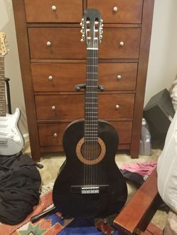 Sunlite acoustic guitar. Model no. GCN-810-BK