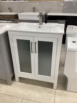 28” vanity, solid wood , white, ceramic top, available for pick up