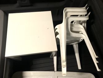 Small Table And Three Stackable Chairs