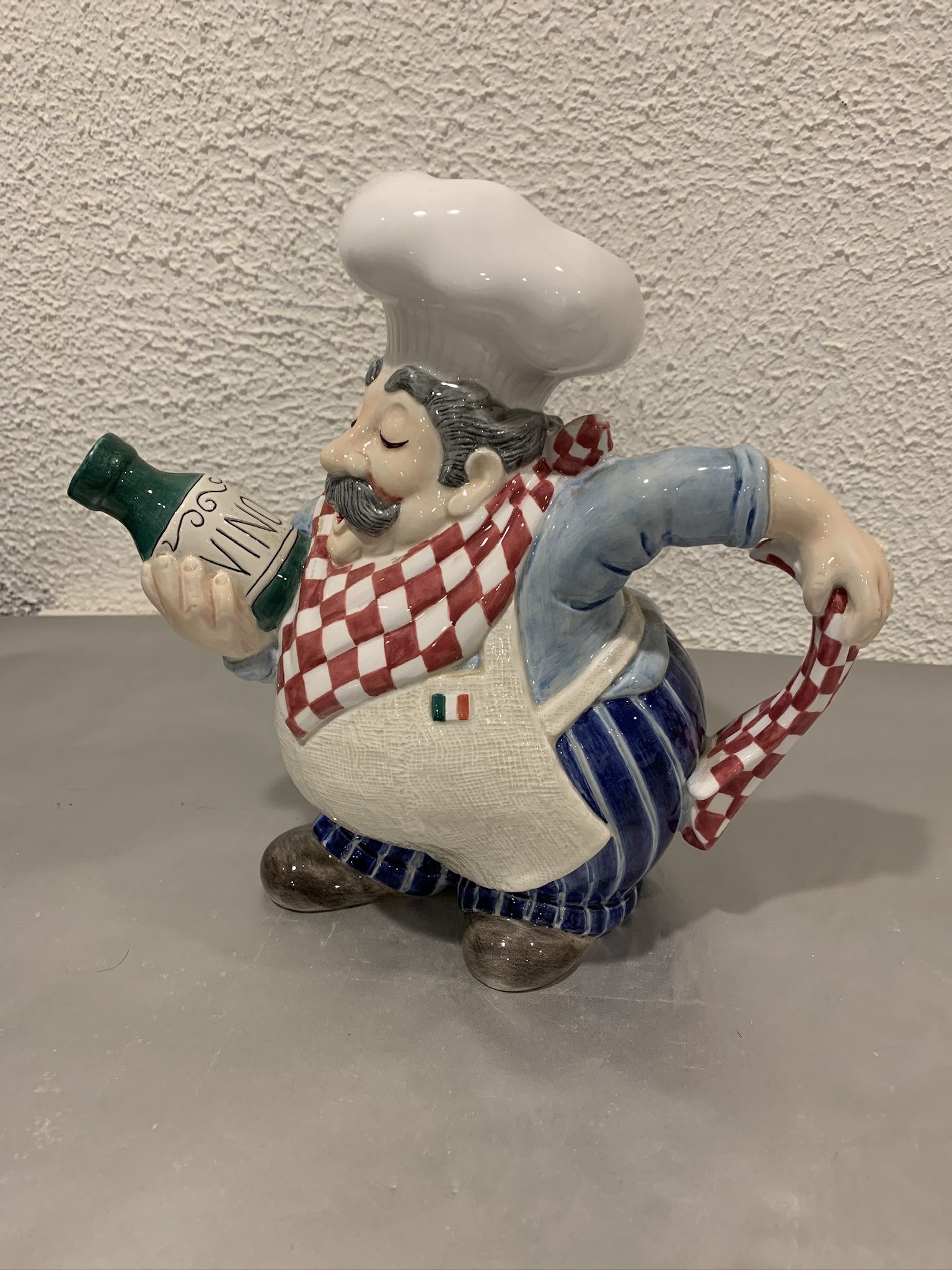 Essential ceramic fits and Floyd pitcher Italian chef with wine vino jug , chef tea pot 10” tall Utensils holder , there is a very tiny chip on the p