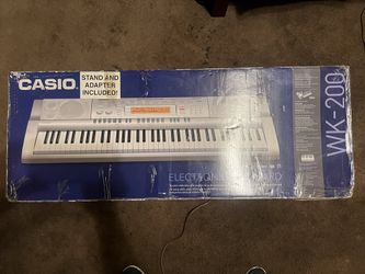 Casio WK-200 76 Key Workstation w/ Keyboard Stand for Sale in Long