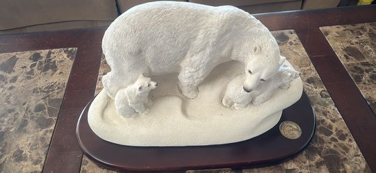 This appears to be a limited edition Ducks Unlimited "Polar Trio" sculpture. 