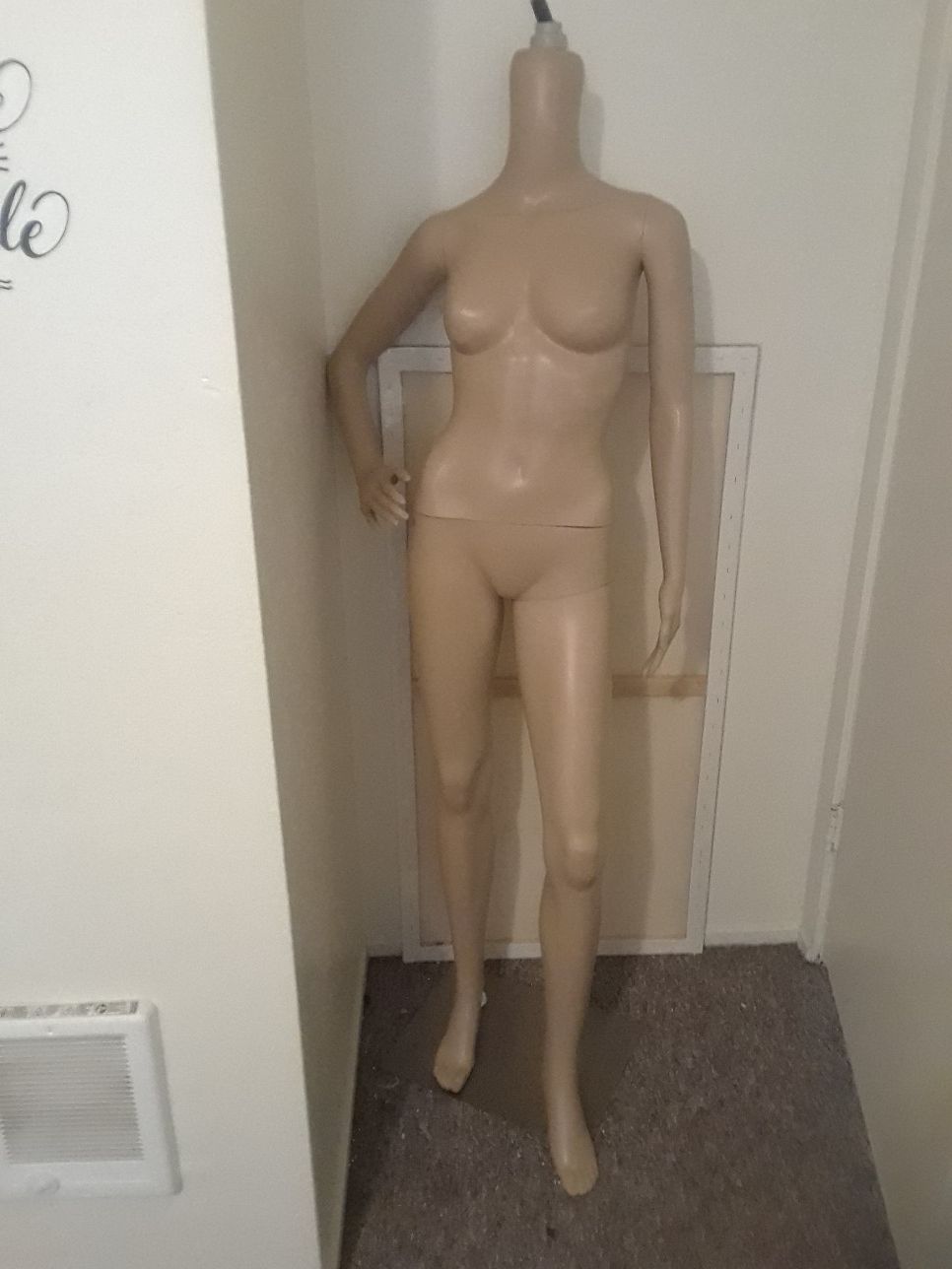 Plastic beige mannequin