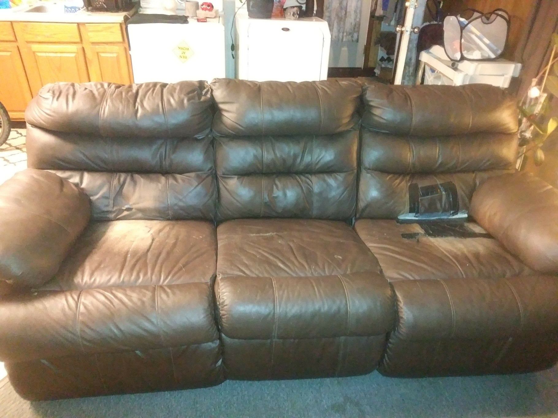 Brown leather couch w/ recliners