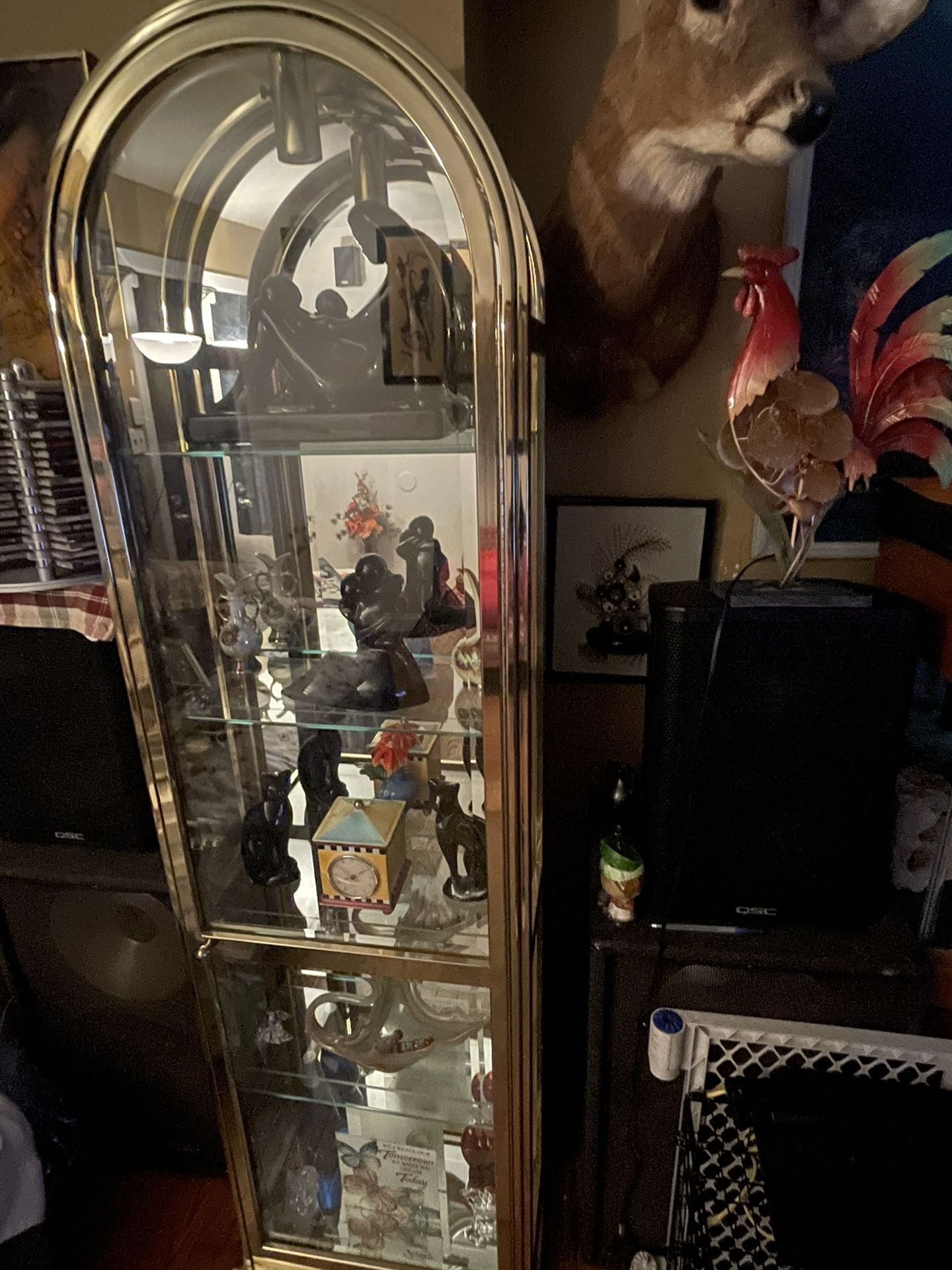 Vintage , Elegant Glass Brass display case is a showstopper in any interior