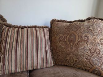 Two cushion LOVESEAT WITH OTTOMAN and  pillows.