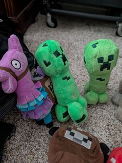 Minecraft stuffies and one Fortnite guy