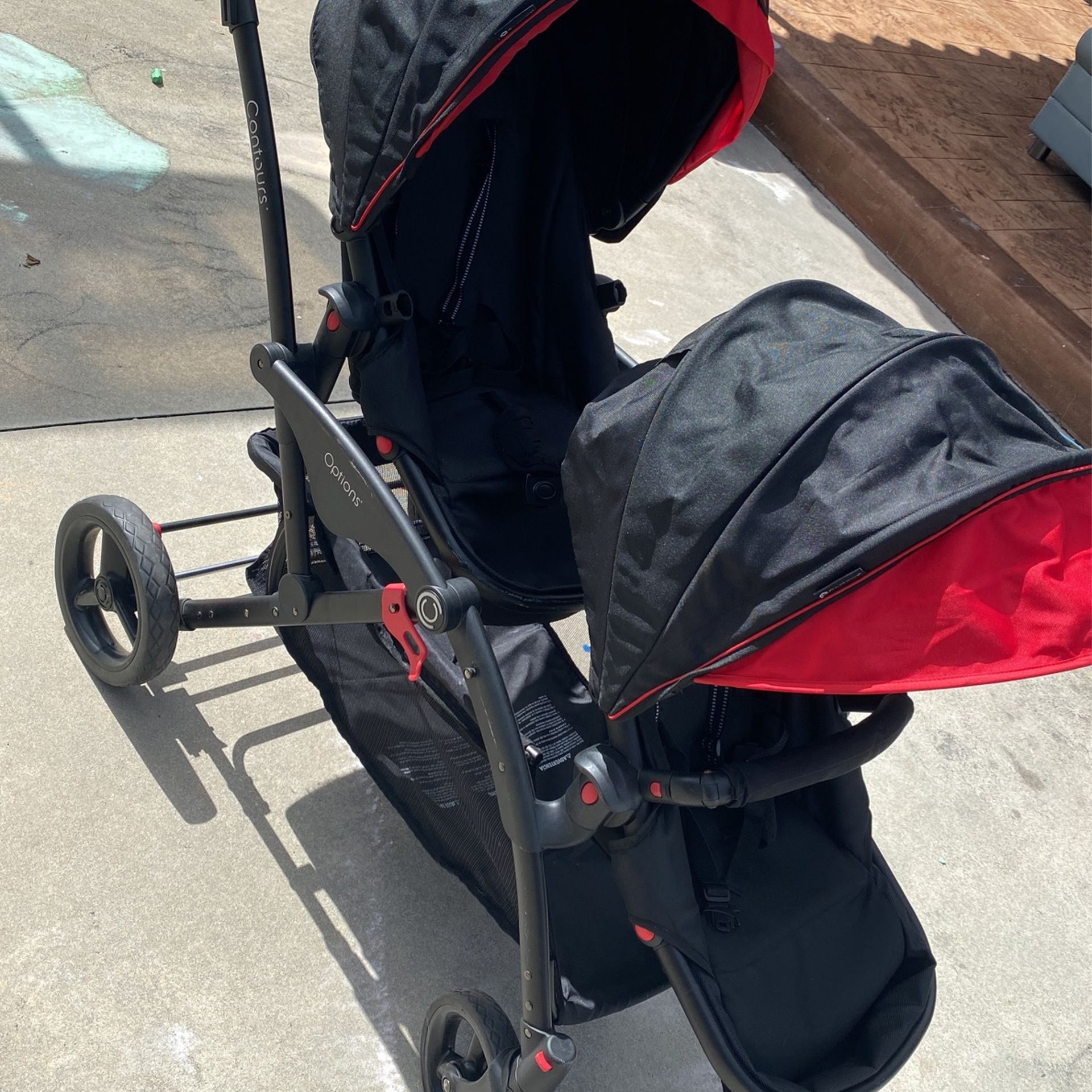 Contours double stroller red and black top