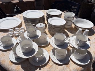 White Porcelain Dinnerware Set with gold Trim
