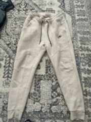 Cream Nike tech pants