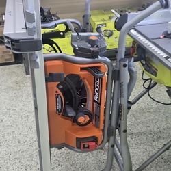 NEW RIDGID 10" TABLESAW WITH ROLLING STAND 220$ RETAILS 550$