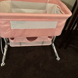 Pink bassinet 