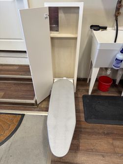 Hideaway swivel ironing board