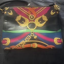 Beautiful Versace crossbody bag.  Multicolored print. Goldtone hardware. Zip closure.  Made in Italy.