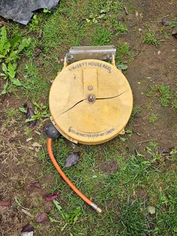 Ceiling-mounted air hose. $20
